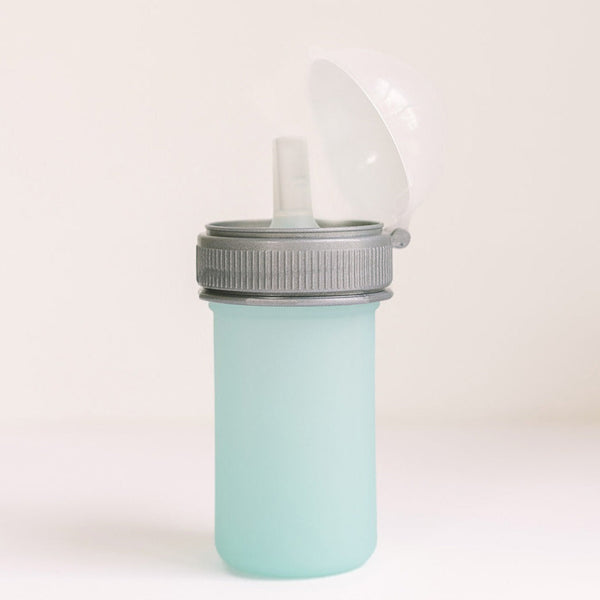 Silicone squeeze pouch for easy baby feeding, durable and reusable feeding utensil.