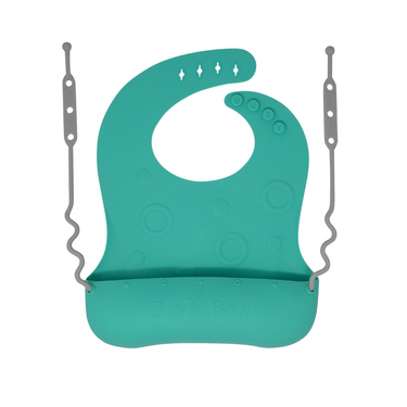 Travel Tether Bib in soft silicone, perfect for mess-free feeding on the go.