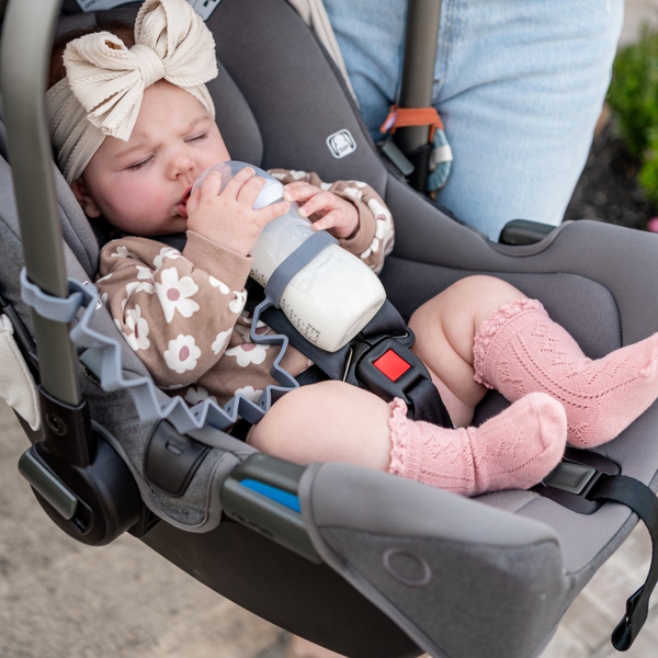 "Angle 7 view of the Bottle Bungee, a secure and convenient baby bottle holder for on-the-go parents."