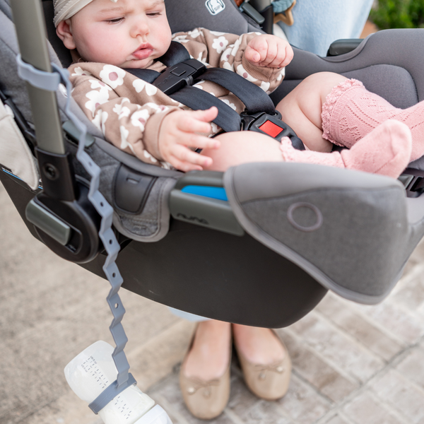 "Angle 4 view of Bottle Bungee, a secure and convenient baby bottle holder for on-the-go parents."