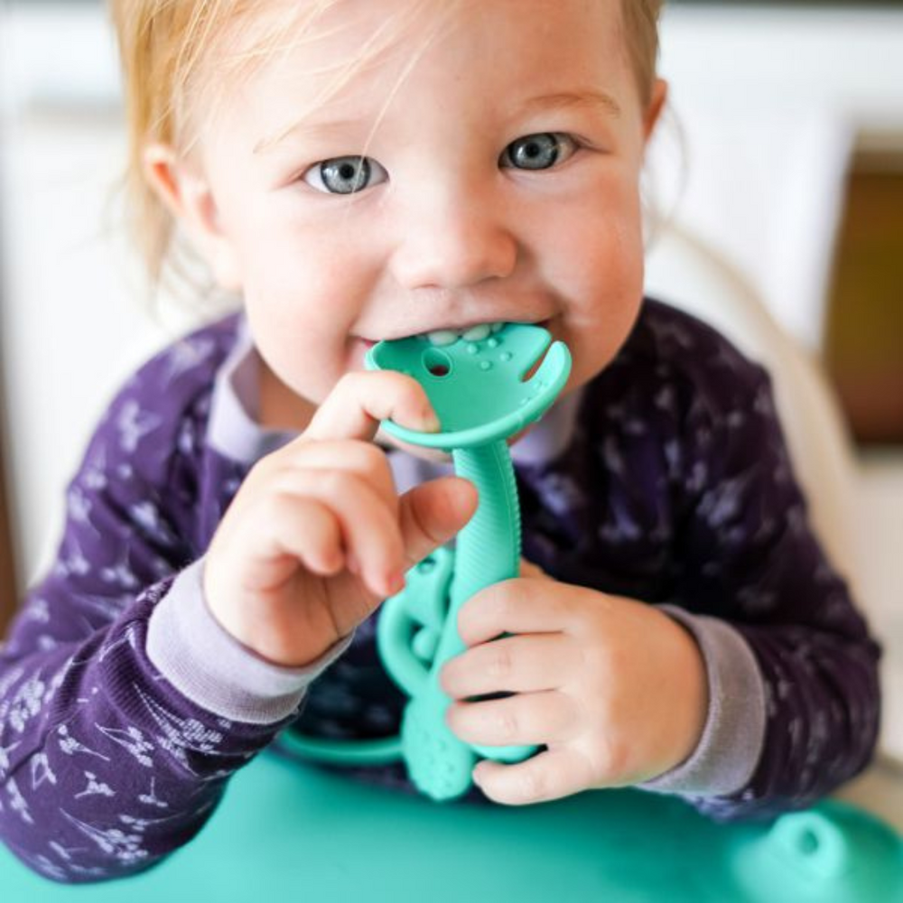 2-in-1 Teether & Training Spoon for babies, perfect for soothing gums and encouraging self-feeding.