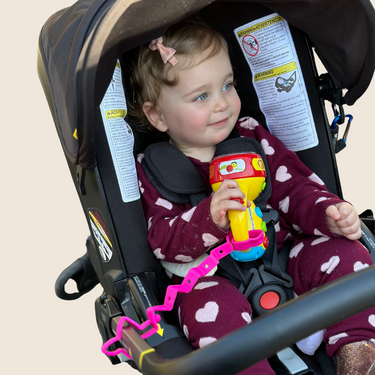 Colorful Toy Bungee Tether for babies, promoting safe play and exploration.