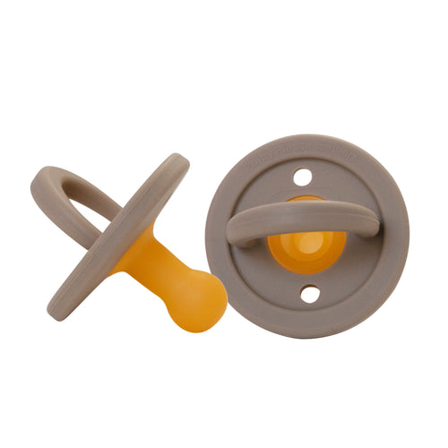 Modern taupe pacifier for babies, designed for comfort and style. Perfect for soothing your little one.