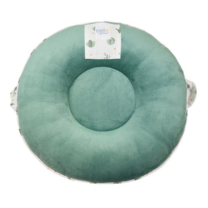Wilder Sage Floor Cushion in a cozy setting, perfect for baby playtime and comfort. Angle view showcasing design.
