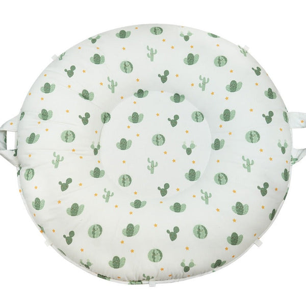 Wilder Sage Floor Cushion in soft green, perfect for baby playtime and nursery decor.