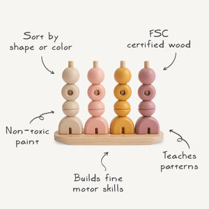 Wooden multi shape stacker in vibrant colors, showcasing various shapes from an angled perspective. Perfect for early learning.