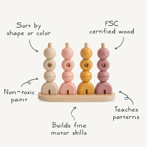 Wooden multi shape stacker in vibrant colors, showcasing various shapes from an angled perspective. Perfect for early learning.