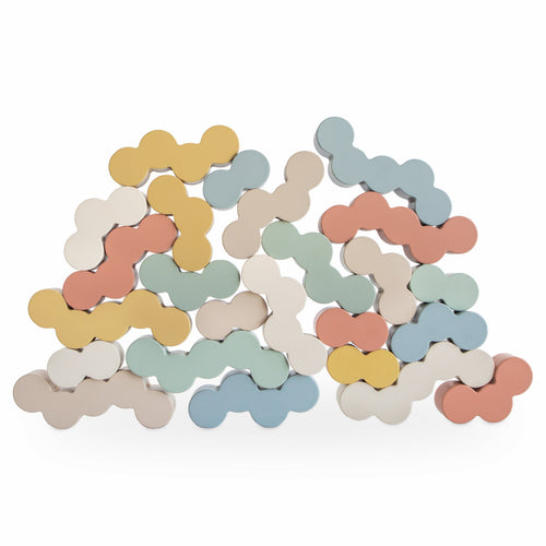 Colorful wooden balance blocks for toddlers, promoting motor skills and creativity in playtime.