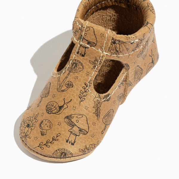 Woodland T-Bar Baby Shoe in angle view, featuring a cute design perfect for little ones' stylish comfort.