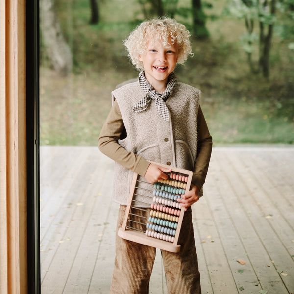 Colorful wooden abacus at angle 6, perfect for early learning and development in babies and toddlers.