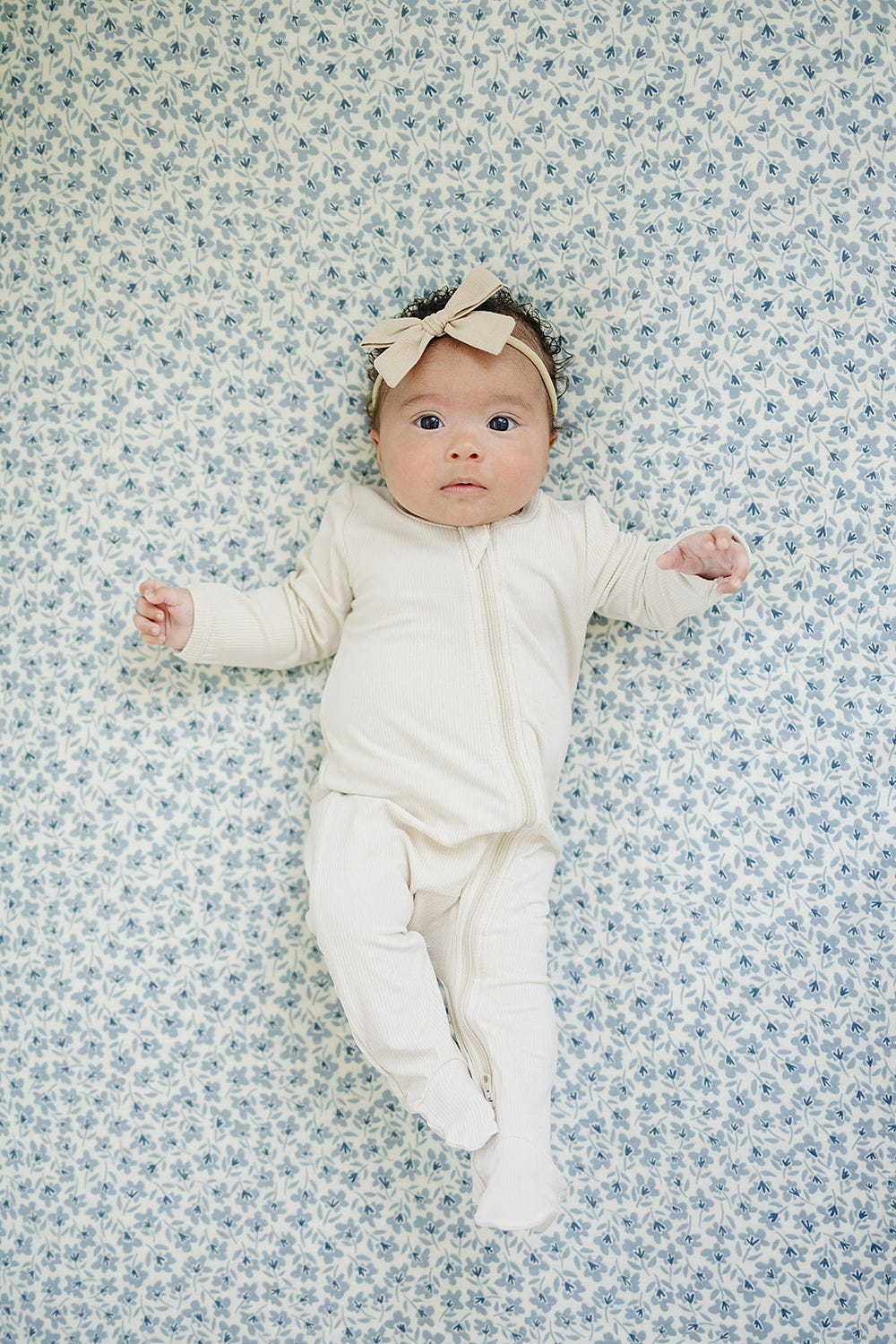 Blue Blossom Muslin Crib Sheet for stylish and comfortable baby bedding. Soft, breathable fabric for a cozy sleep environment.