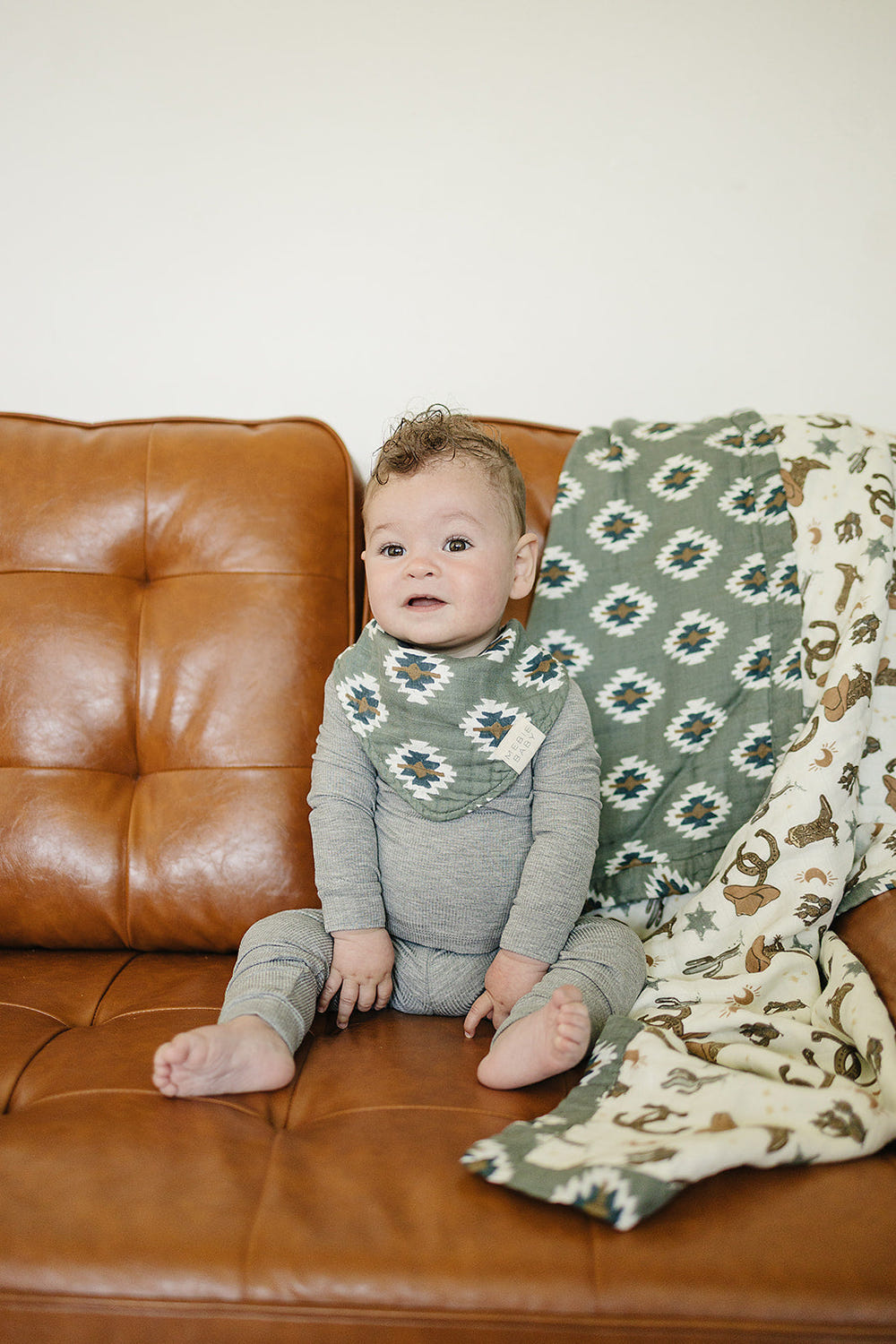Southwest Aztec Classic Muslin Bib for babies, featuring a stylish design and soft, absorbent fabric.