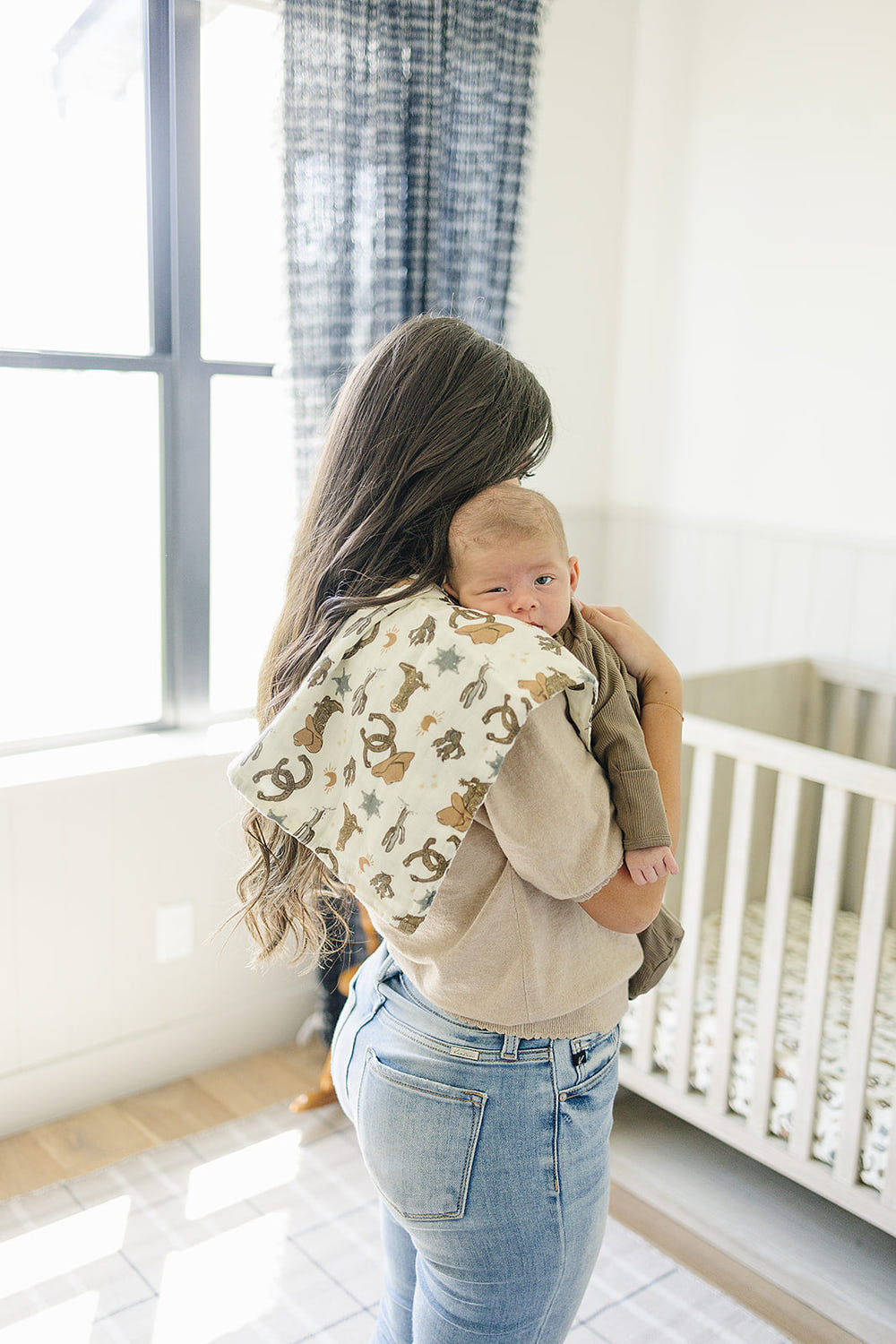 Outlaw Cowboy Muslin Burp Cloth for babies, soft and stylish, perfect for feeding and drool protection.