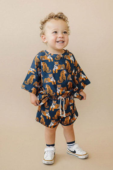 Tiger-themed baby shorts set for playful and stylish little ones. Perfect for warm weather adventures!