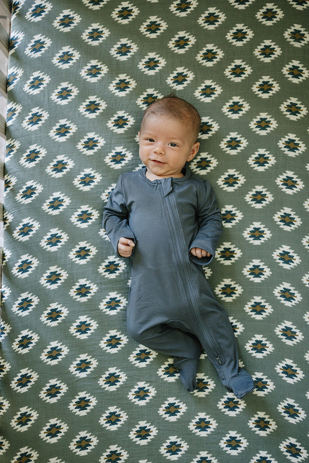 Southwest Aztec muslin crib sheet for stylish and comfortable baby bedding.