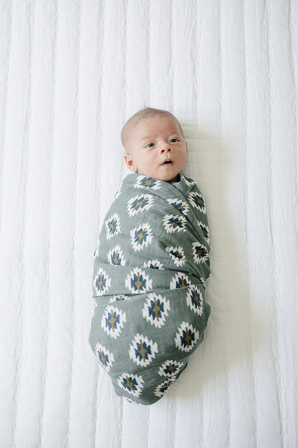 Southwest Aztec Muslin Swaddle Blanket for babies, featuring a stylish design and soft, breathable fabric.