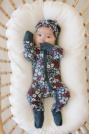 Americana Floral Ribbed Bamboo Zipper Pajamas for babies, showcasing a stylish design in a cozy angle view.
