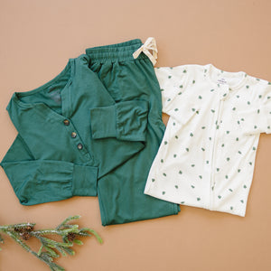 Tiny Trees Ribbed Bamboo Zippy Pajamas for babies, soft and cozy sleepwear in a stylish angle view.