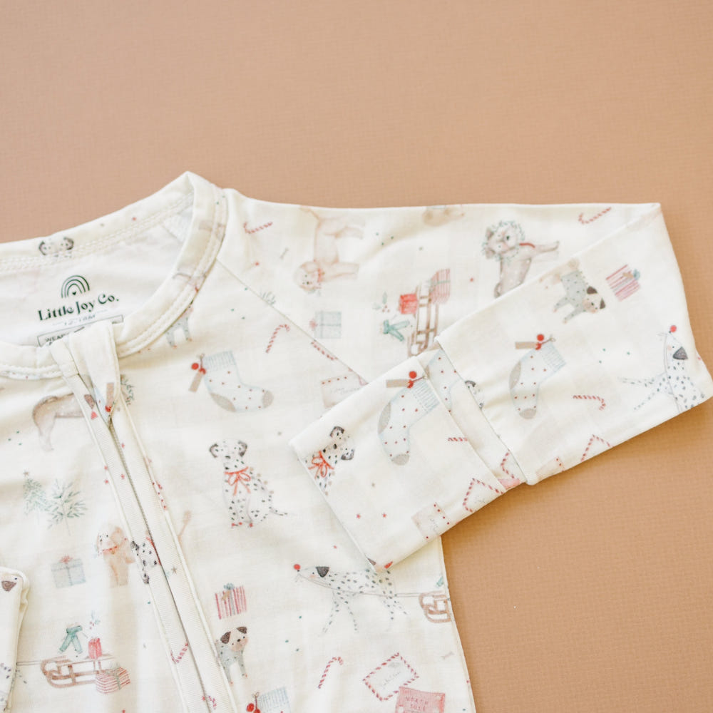 Santa Paws Bamboo Zippy Pajamas for babies, featuring festive design and soft, breathable fabric. Perfect holiday sleepwear!