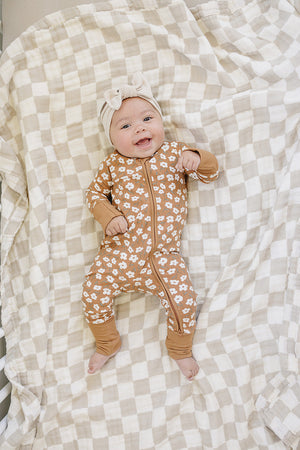 Mustard floral ribbed bamboo zipper bedding for babies, showcasing a cozy and stylish sleep solution.