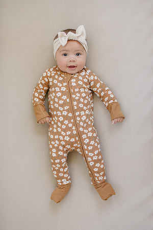 Mustard floral ribbed bamboo zipper bedding for babies, showcasing a cozy and stylish sleep solution.