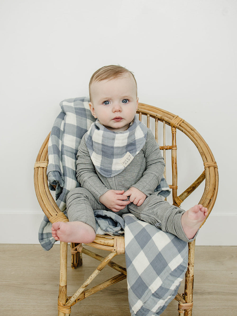 Dusty blue gingham classic muslin bib for babies, soft and stylish for mealtime messes.