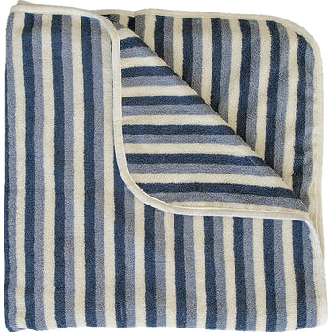 Blue stripe organic cotton beach towel for babies, perfect for sunny days at the beach or pool.