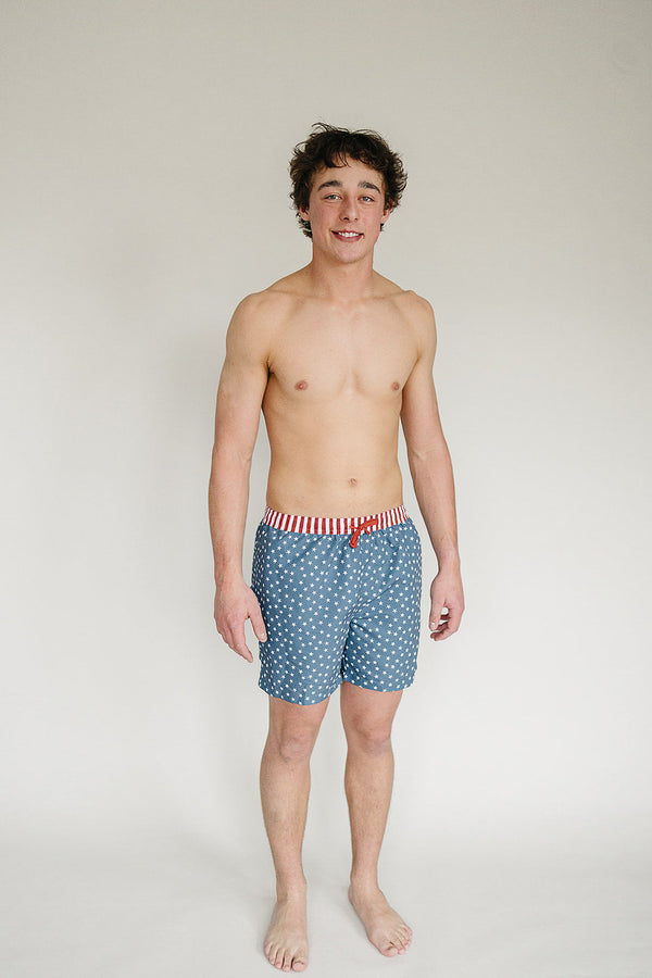 Men's swim shorts featuring a stars and stripes design, shown from angle 2. Perfect for summer fun and beach days.