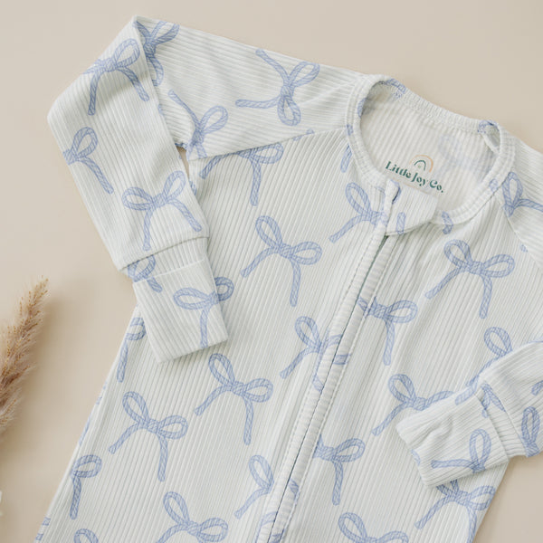 Blue Belle Ribbed Bamboo Zippy Pajamas for babies, soft and stylish, shown from angle 13. Perfect for cozy sleep.