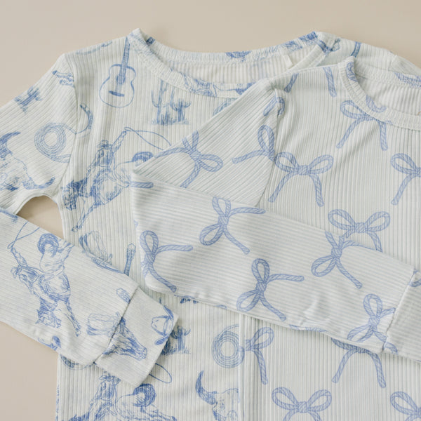 Blue Belle 2pc ribbed bamboo pajamas for babies, cozy and stylish sleepsuit set, angle view.