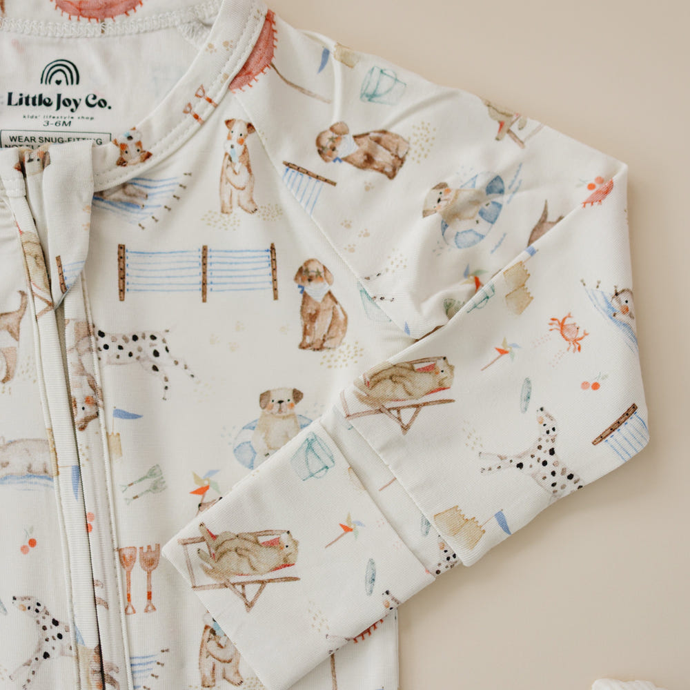 Baby Beach Pawty Bamboo Zippy Pajamas in vibrant colors, perfect for comfy beach days and playful adventures.