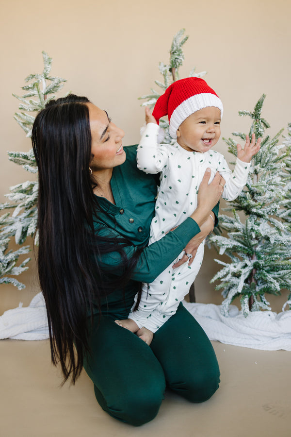 Tiny Trees Ribbed Bamboo Zippy Pajamas for babies, cozy sleepwear in soft bamboo fabric, angle view.
