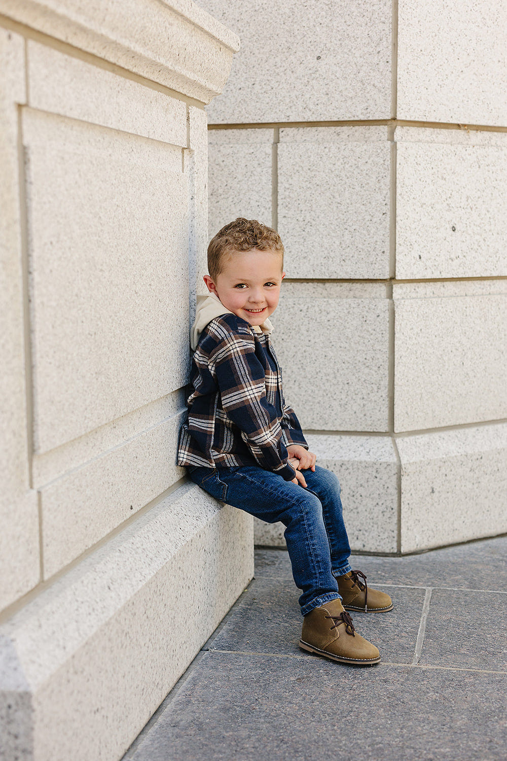 Plaid hooded button-up shirt for babies, stylish and cozy clothing for little ones.