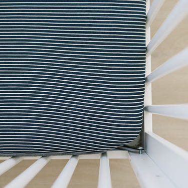 Navy stripes bamboo stretch crib sheet for cozy and stylish baby bedding.