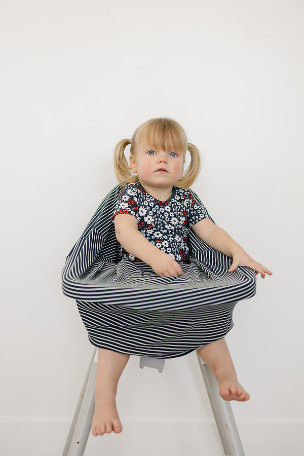 Navy stripes ribbed bamboo multi-use cover for babies, shown from angle 3. Perfect for nursing and stroller use.