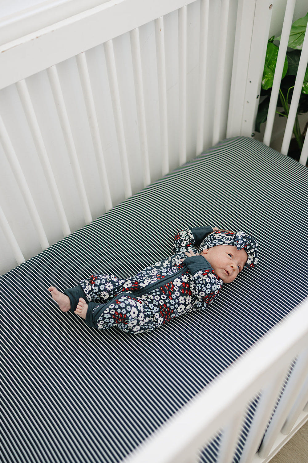 Navy stripes bamboo stretch crib sheet for cozy and stylish baby bedding.