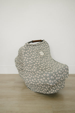 Light green daisy bamboo multi-use cover for babies, shown from angle 4, perfect for nursing and stroller use.