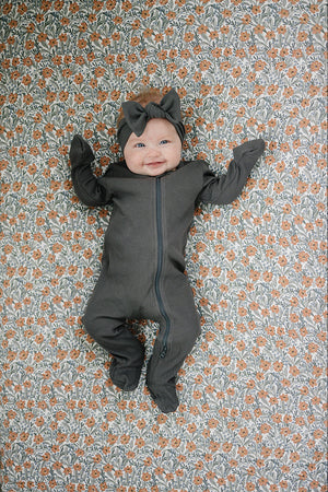 Dainty Meadow Bamboo Stretch Crib Sheet in soft pastel colors, perfect for cozy nursery bedding.