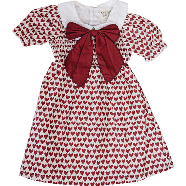 Heart Bow Dress for babies, featuring a cute design perfect for special occasions and everyday wear.