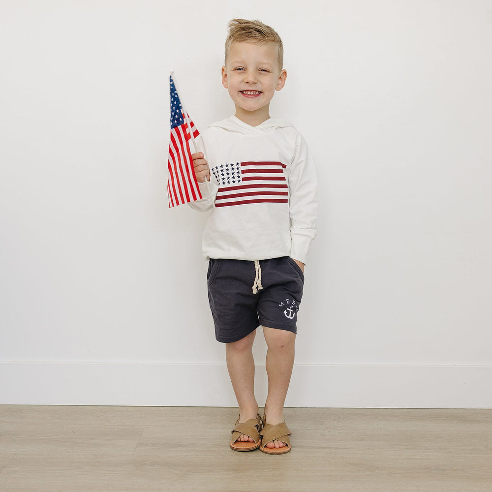 Baby flag hoodie in soft fabric, perfect for stylish warmth in outerwear and jackets.