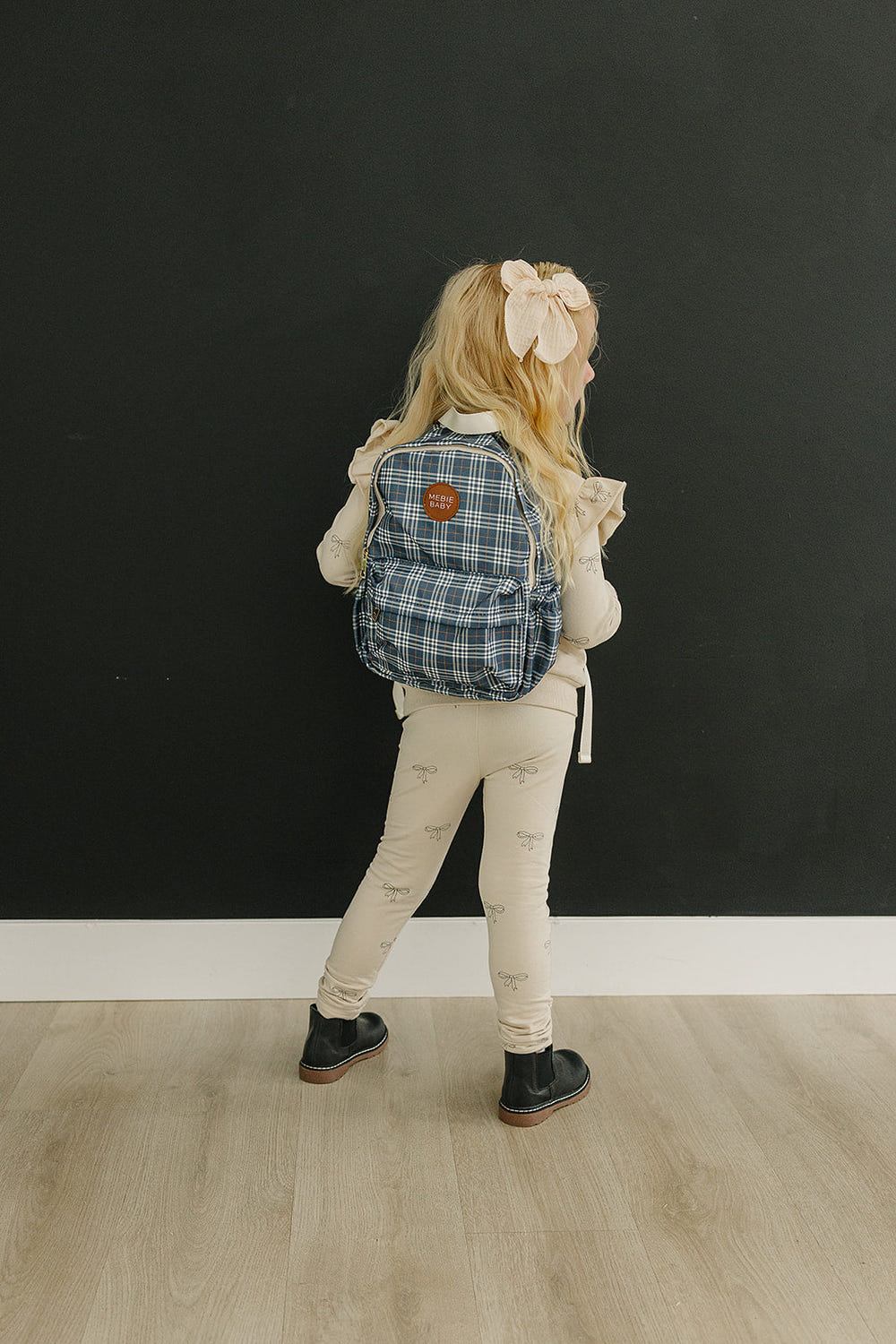 Navy plaid mini backpack for babies, perfect for stylish outings and everyday use.