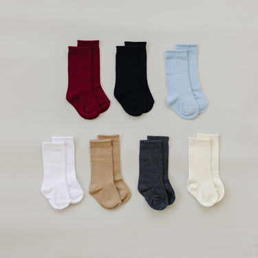 Mebie High Rise Socks for babies, soft and stylish, perfect for keeping little feet warm and cozy.