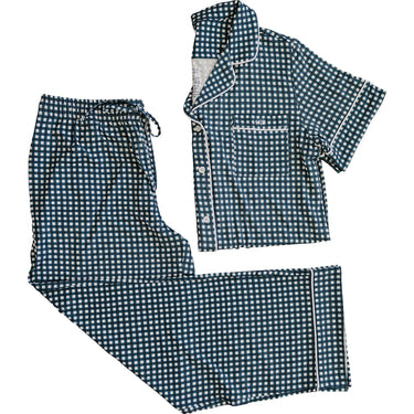 Women's navy gingham pajama set for babies, perfect for cozy sleep and stylish bedding.