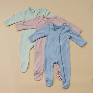 Bamboo Footed Zippy Pajamas for babies, soft and eco-friendly sleepwear in a cozy design.