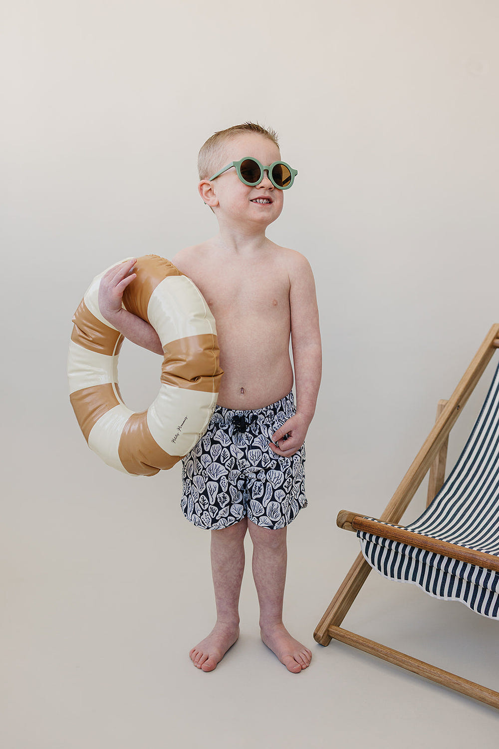Coral Reef Swim Shorts for babies, vibrant design perfect for summer fun and beach adventures.