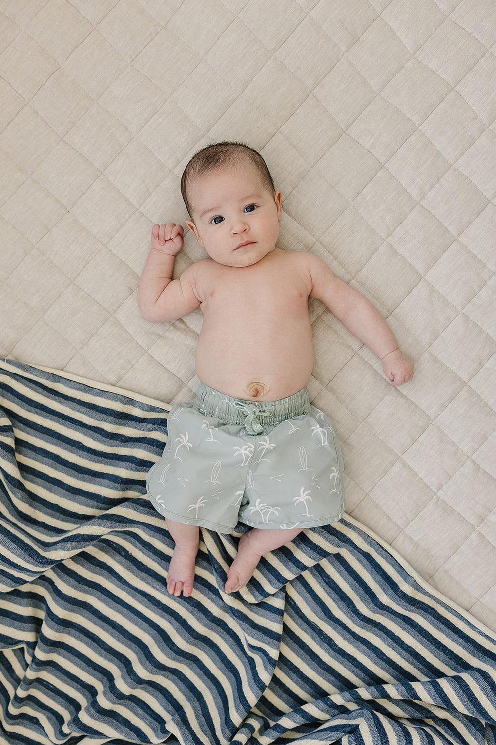 Sage Surfer Swim Shorts for babies, stylish and comfortable swimwear for sunny days at the beach or pool.