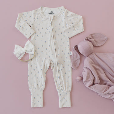 Tiny Tulips Bamboo Zippy Pajamas for babies in soft, breathable fabric, perfect for comfortable sleep and play.