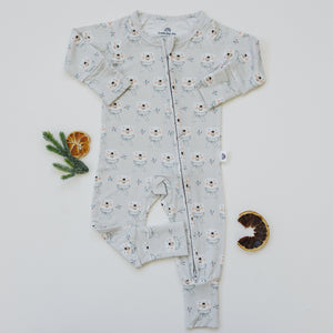 Polar Bear Zippy Romper for babies, featuring a cute polar bear design, shown from angle 2. Perfect for cozy wear.