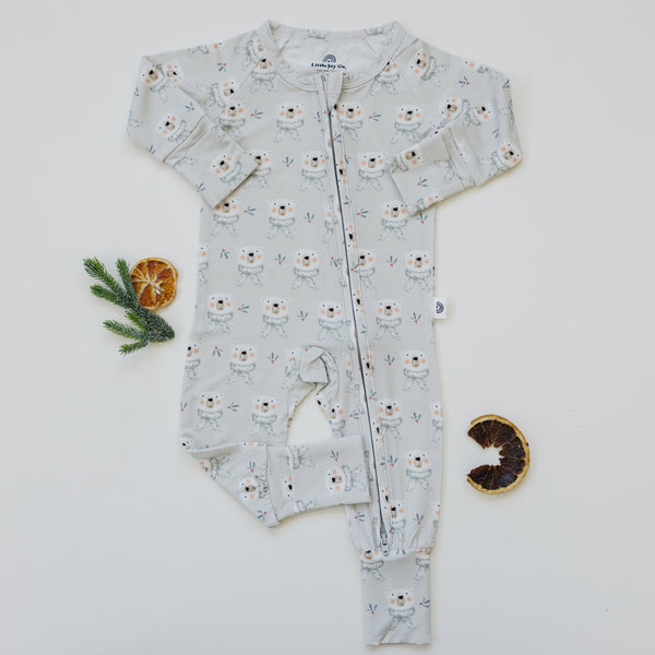 Polar Bear Zippy Romper for babies, featuring a cute polar bear design, shown from angle 2. Perfect for cozy wear.