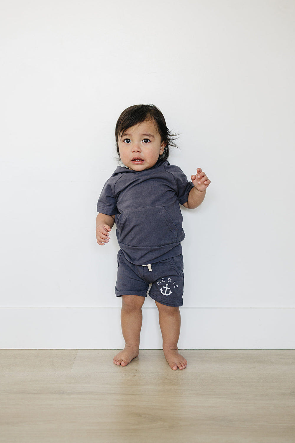 Slate Hooded Tee for babies, soft and stylish, perfect for cozy comfort in any nursery setting.